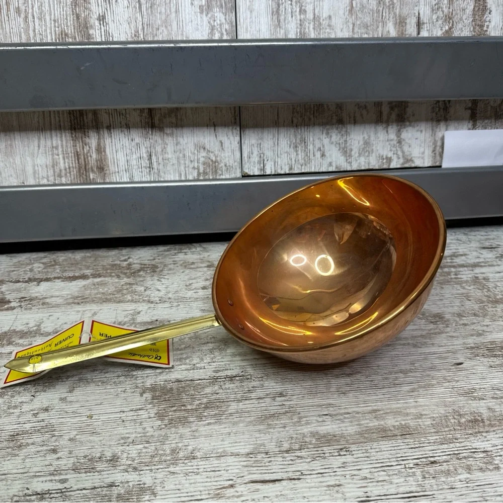 Copper pan or decorative bowl.